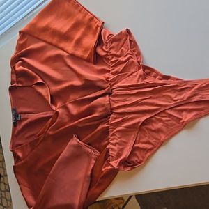 Rust silky body suit size large